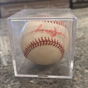 Signed Reggie Jackson Baseball in Clear Display Case